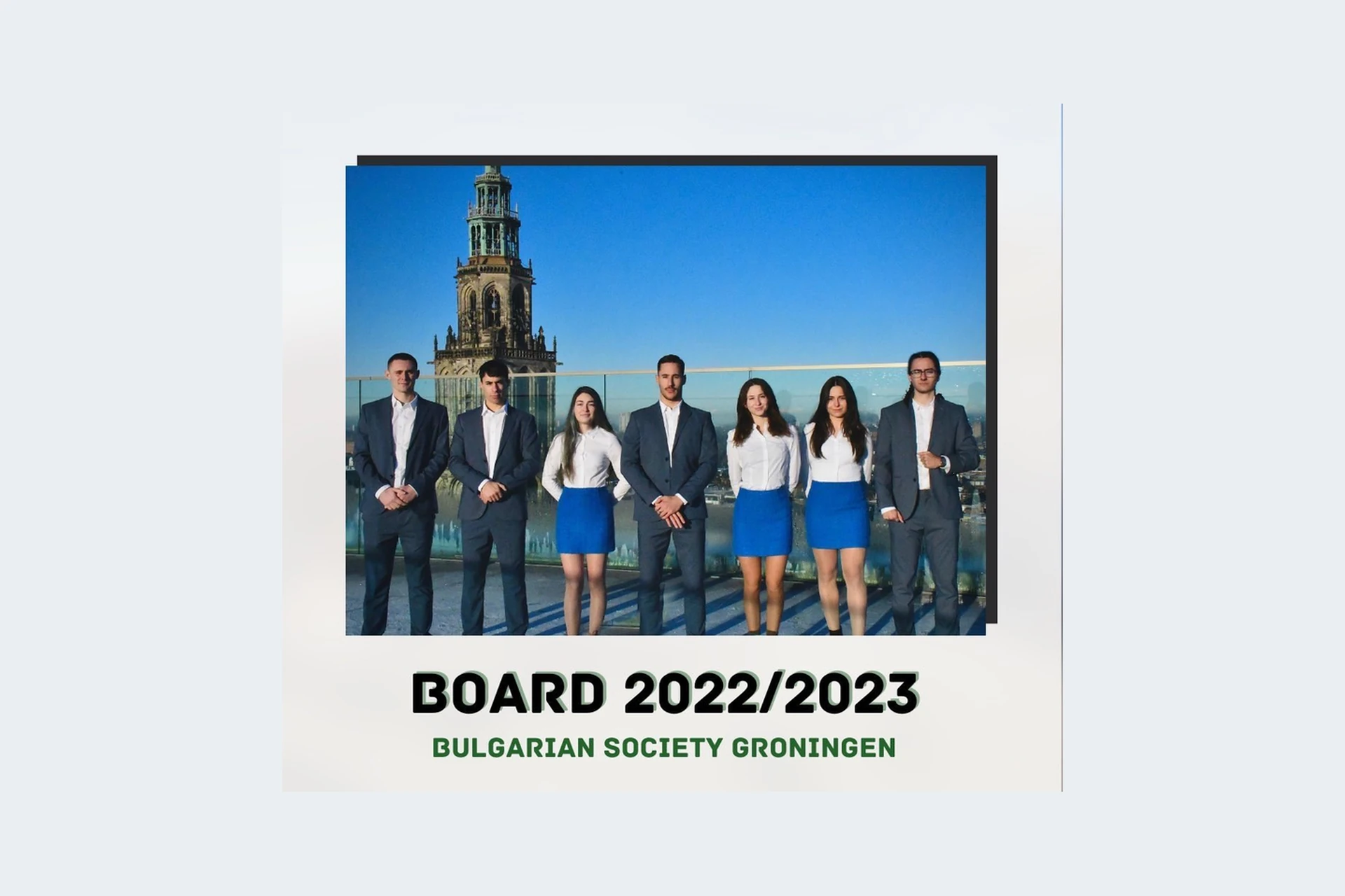 The first board of Bulgarian Society Groningen, 2022/2023, seven of us on a rooftop with the Martinitoren behind.