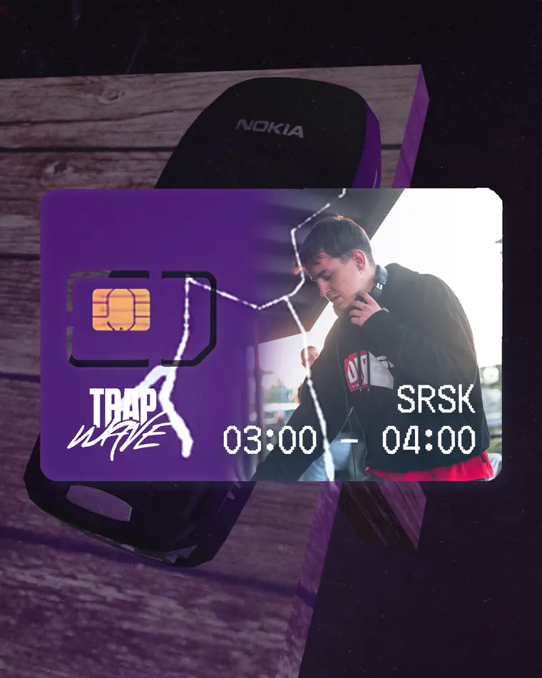 A SIM card carrying SRSK sliding out of the phone.