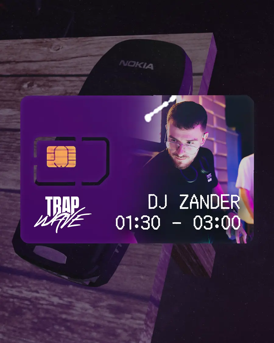 A SIM card carrying Zander sliding out of the phone.
